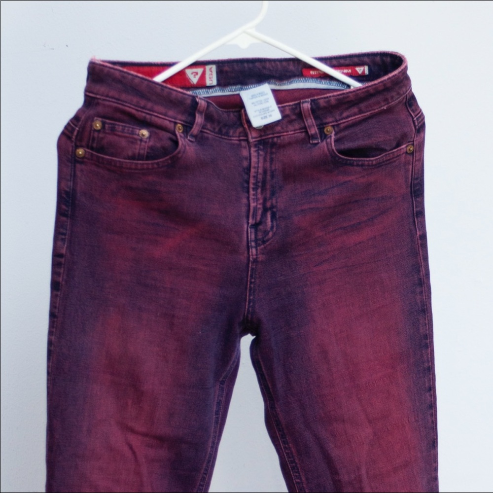 Guess stretch flare pink jeans.